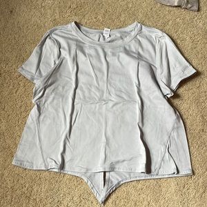 Grey athletic feeling shirt with tie in the back